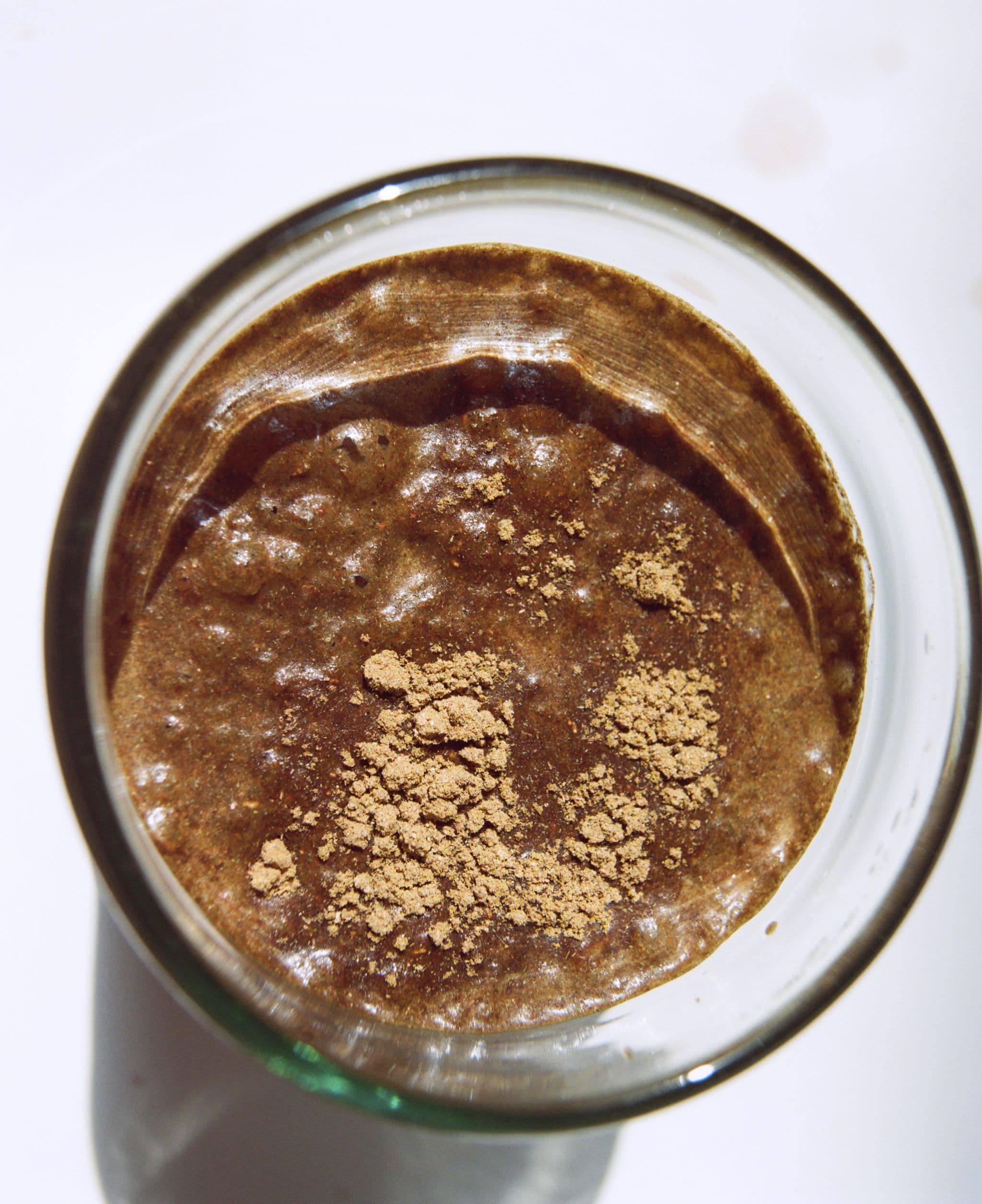 Ultimate Beauty Powder mixed with Water in glass